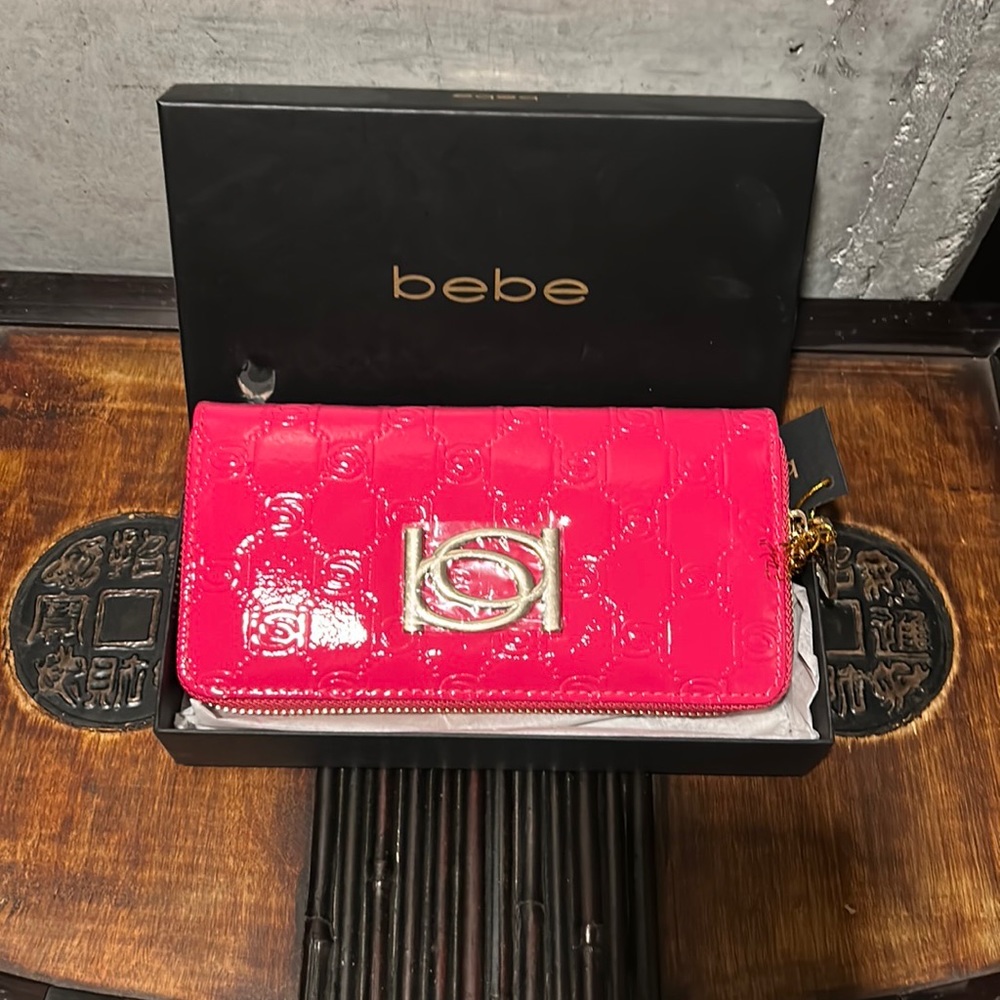 Brand new pink Bebe wallet! Never used! In box! Zipper wallet